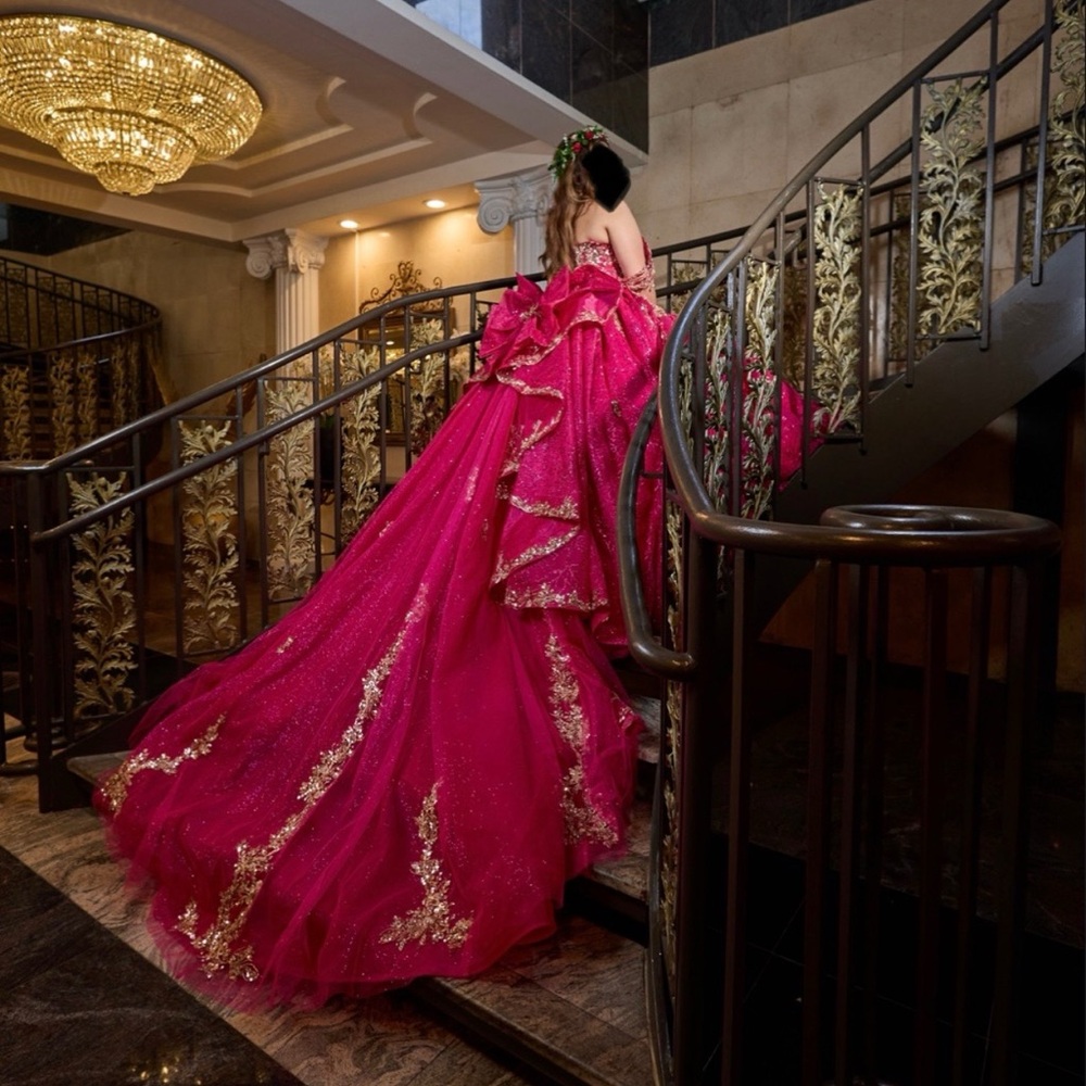 Elegant Pink Gown with Gold Accents